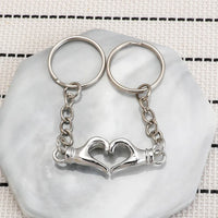 Porte-cles mains coeur couple
