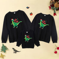 pull moche noel dinosaure