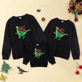 pull moche noel dinosaure