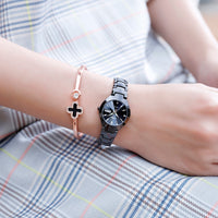 Montre en acier noir femme
