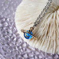 collier planète homme