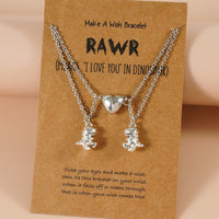 collier dinosaure avec message