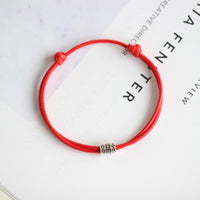 bracelet rouge porte bonheur