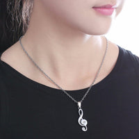 Pendentif clé de sol argent