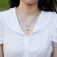 Collier Couple Main Enlacé