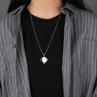 collier pièce de puzzle