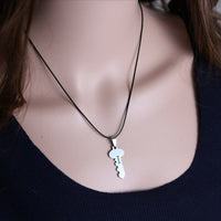 collier femme clé